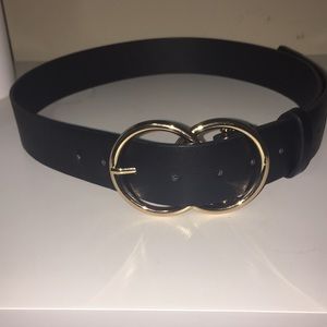 Black belt with gold buckle